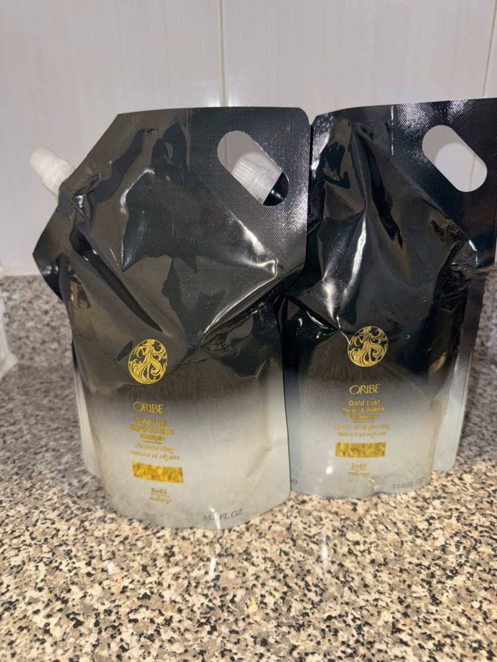 Oribe Gold Lust repair & restorative Duo Refill Pouches in Black and Gold - Picture 3 of 3